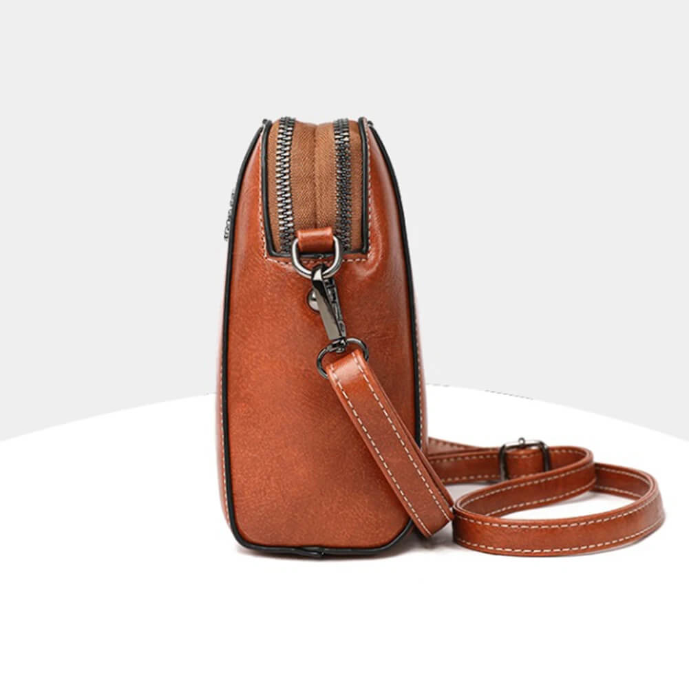 Retro Crossbody Läderväska för Kvinnor - Justerbar Axelrem, Lättförvarad och Stilren